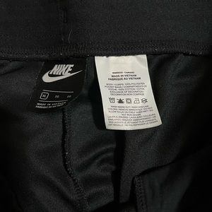 Nike brand’ size XL, sweatsuit top and bottom, used but great condition